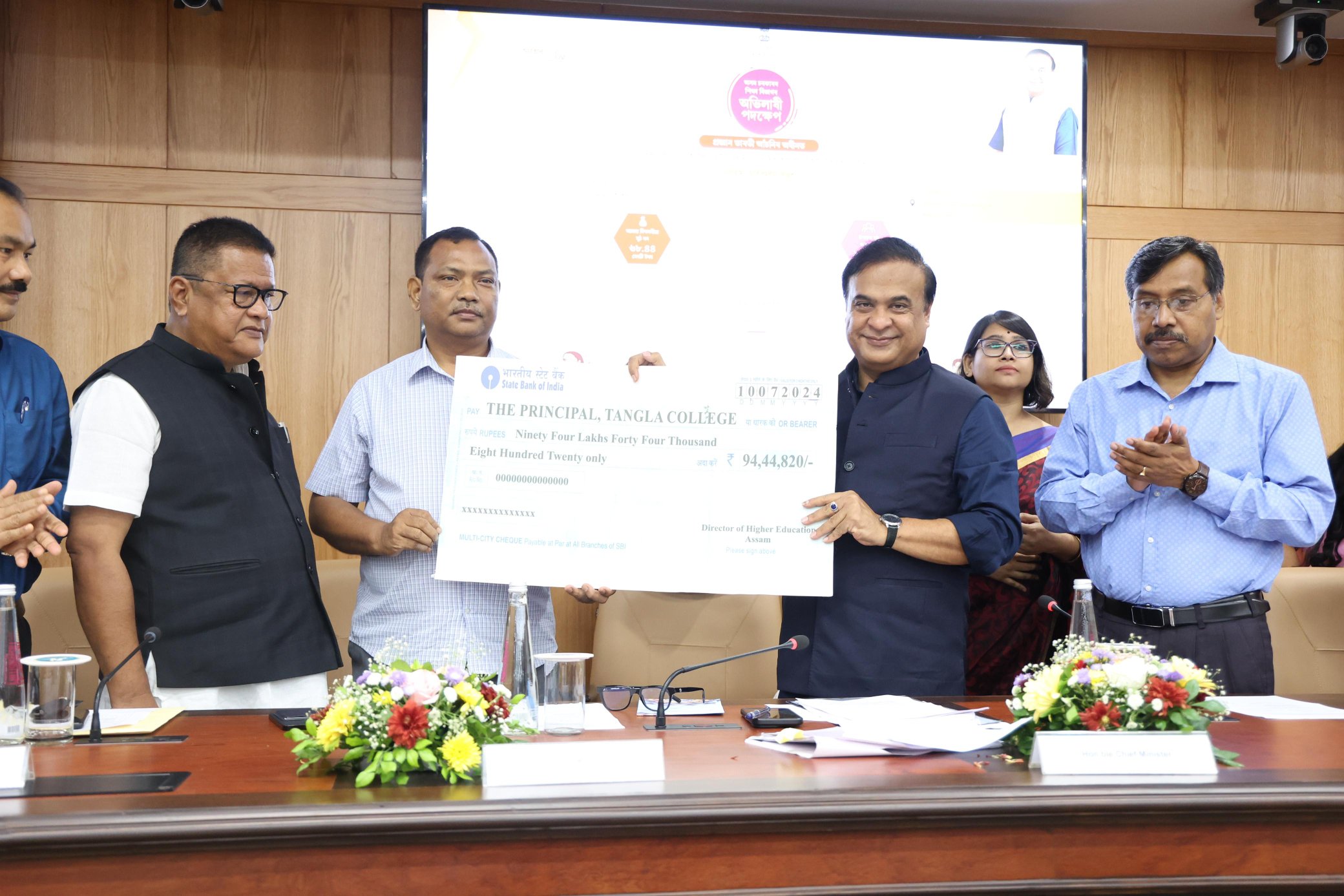 Distribution of money for the first phase of 'Pragyan Bharati Scheme' 